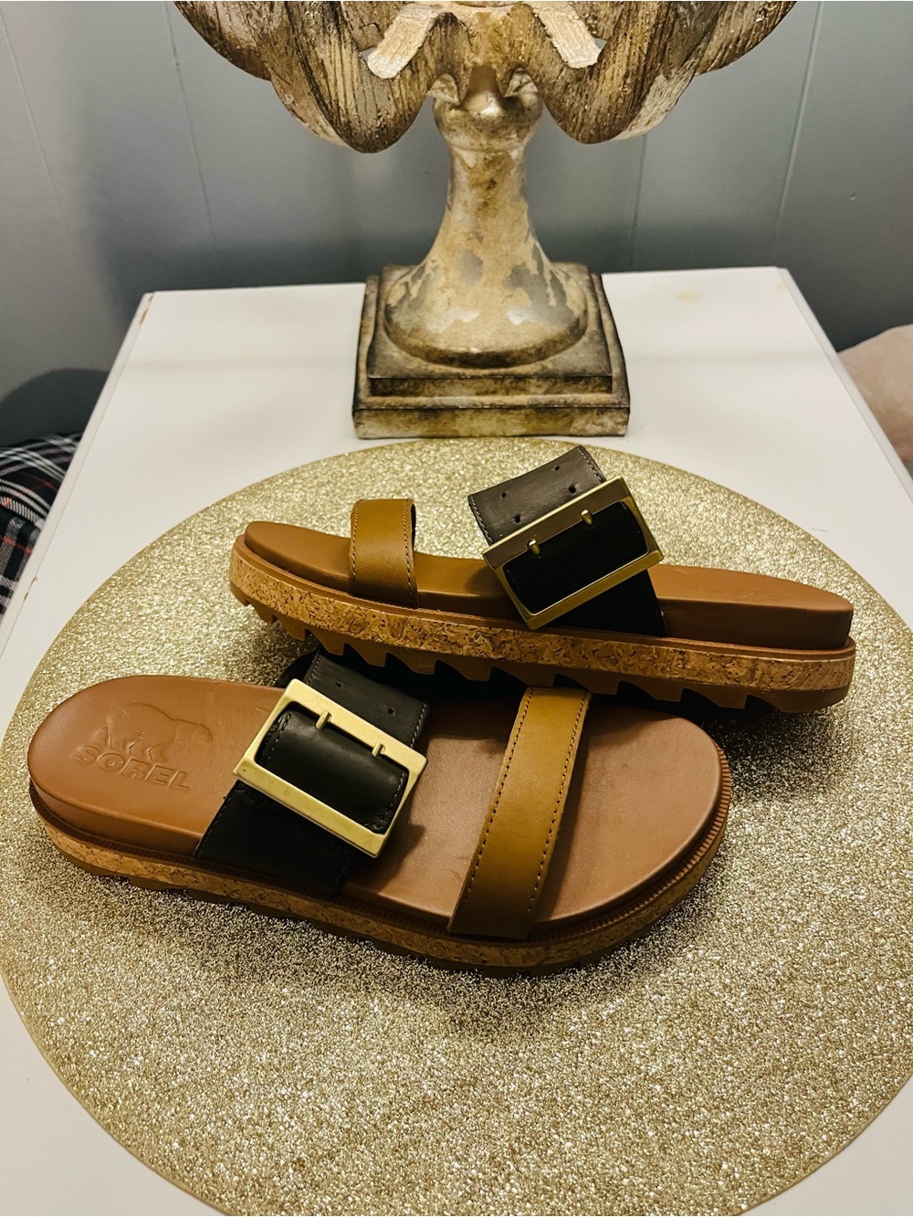 Sorel Women's Brown and Black Slide Sandals with Gold Buckle
